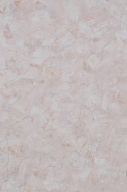 Beton duvar doku bej renkli sıva ile. Güzel tasarım cephe sıva duvarlar çeşitli şekiller küçük çukurlar ile boyalı. İç veya dış duvarlar için doku