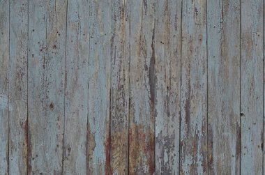 Yıpranmış ahşap duvarın dokusu. Dikey düz tahtalardan oluşan eski ahşap çitler.