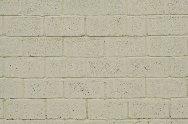 Weathered and stained colored yellow block wall texture — Stock Photo, Image