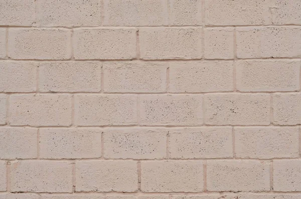 Weathered and stained colored beige block wall texture — Stock Photo, Image