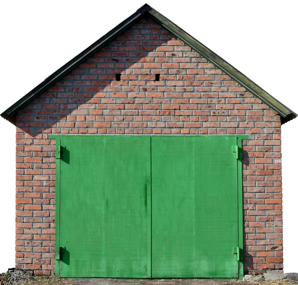 A textura de um portão de metal pintado de uma garagem de tijolos — Fotografia de Stock