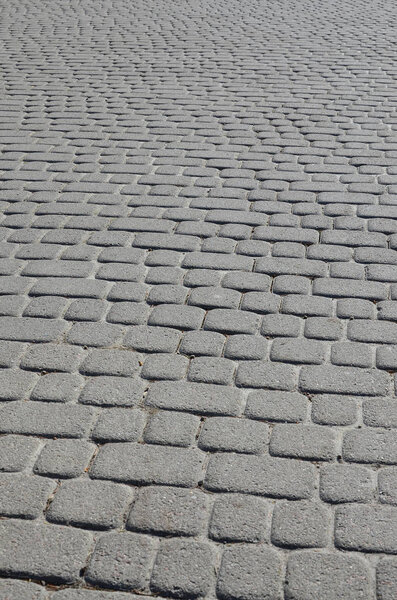 Background photo close-up of a large platform of paving stone in