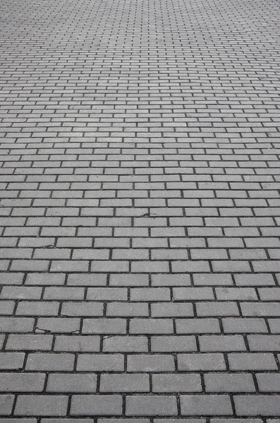 Foto del sitio de la antigua losa de pavimentación con pequeños defectos y — Foto de Stock