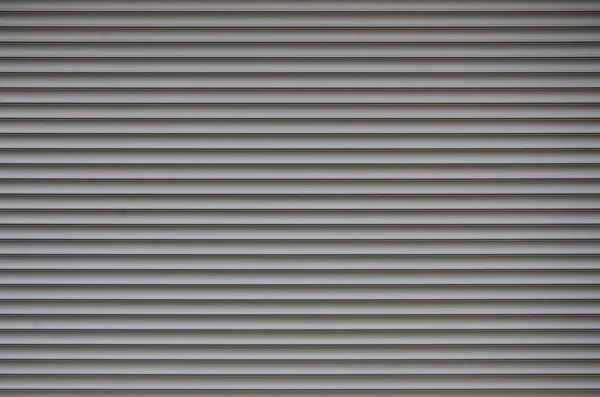 Η υφή του διαφράγματος πόρτα ή το παράθυρο στο φως γκρι χρώμα — Φωτογραφία Αρχείου