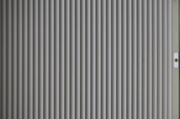 La textura de la puerta o ventana del obturador en color gris claro — Foto de Stock