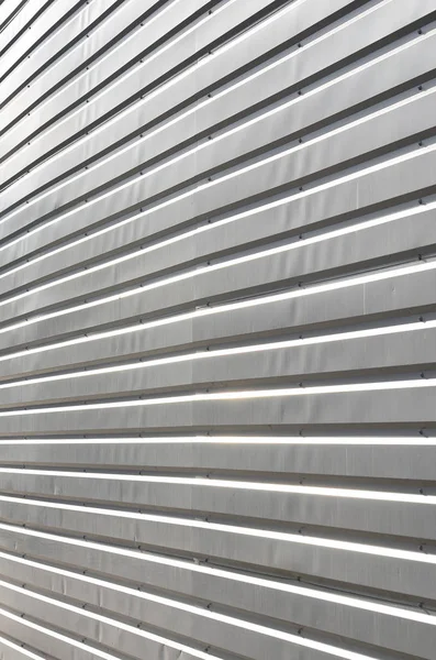 The texture of the wall is made of metal coating of huge aluminu — Stock Photo, Image
