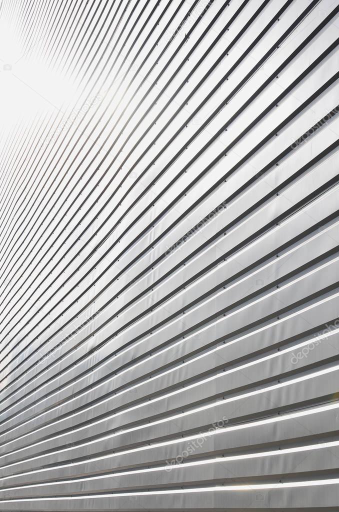 The texture of the wall is made of metal coating of huge aluminu