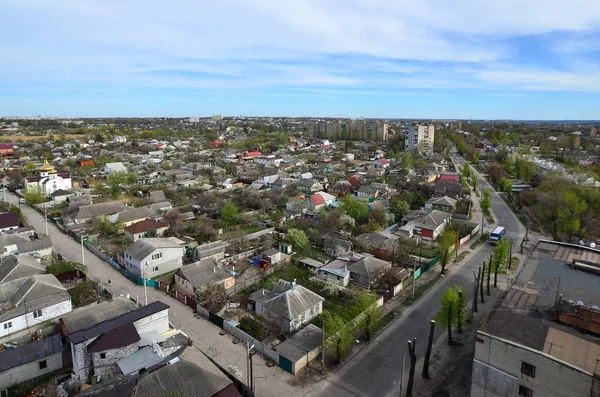 Landscape of an industrial district in the Kharkov city from a bird's eye view. A lot of houses and enterprises of Chervonozavodsky district in Kharkov on a sunny clear day