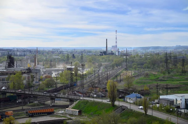 Landscape of an industrial district in the Kharkov city from a bird\'s eye view. A lot of workers\' factories and enterprises near the railroad tracks of the Chervonozavodsky District