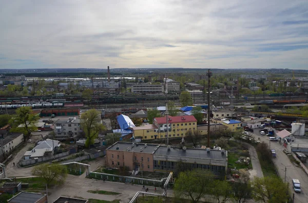 Landscape of an industrial district in the Kharkov city from a bird\'s eye view. A lot of workers\' factories and enterprises near the railroad tracks of the Chervonozavodsky District