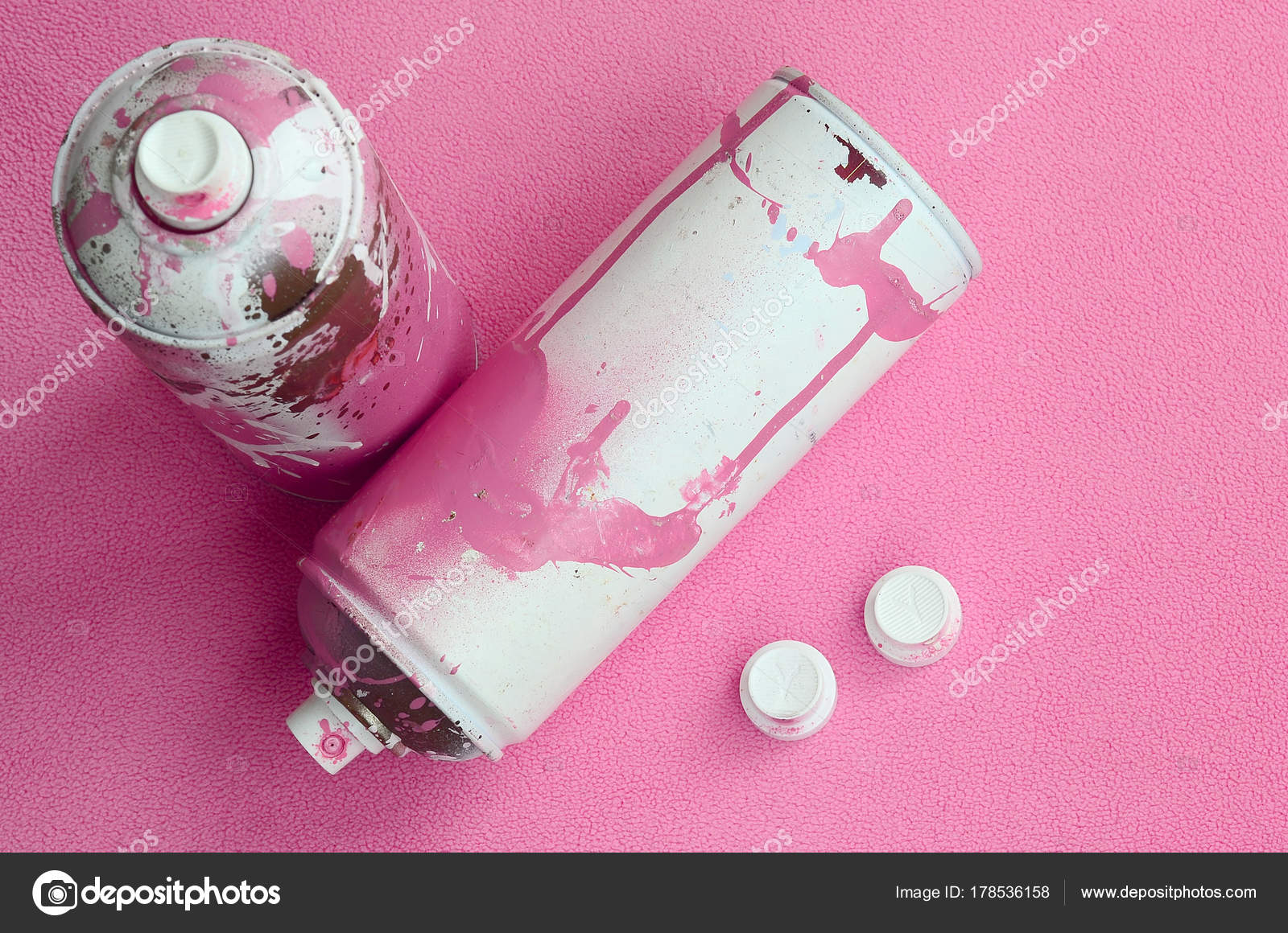 Some Used Pink Aerosol Spray Cans Nozzles Paint Drips Lies Stock