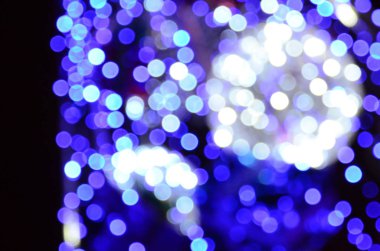 Yeni yıl ağacı bulanık parçası. Lots-in mavi yuvarlak ışık