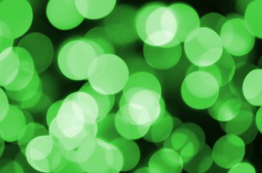 Yeşil soyut Noel aydınlık arka plan bulanık. Ufuk sanatsal bokeh ışık görüntü