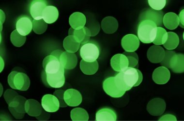 Yeşil soyut Noel aydınlık arka plan bulanık. Ufuk sanatsal bokeh ışık görüntü