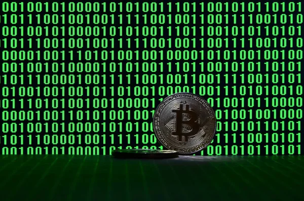 Pair Bitcoins Lies Cardboard Surface Background Monitor Depicting Binary Code — Stock Photo, Image