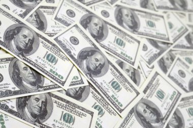 Yüz ABD banknotlar Başkan portreleri ile yığını. Nakit yüz doları kambiyo Doları arka plan görüntüsü yüksek çözünürlüklü