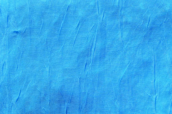 Blauw Doek Materiaal Fragment Gevouwen Als Een Achtergrondstructuur — Stockfoto
