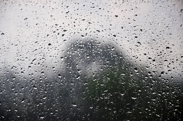 Imagen Fondo Gotas Lluvia Una Ventana Vidrio Macro Foto Con —  Fotos de Stock