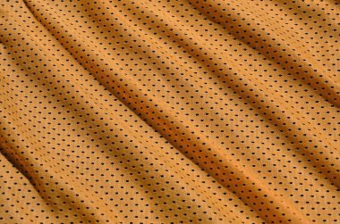 Spor giyim dokusuna polyester elyaf yapılmış. Dış Giyim spor eğitim için bir mesh dokusu gerilebilir naylon kumaş vardır