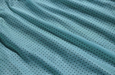 Spor giyim dokusuna polyester elyaf yapılmış. Dış Giyim spor eğitim için bir mesh dokusu gerilebilir naylon kumaş vardır