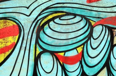 Arka plan resmi bir beton duvara sprey boya ile uygulanan bir grafiti desenli