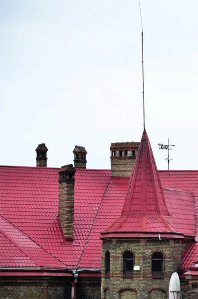 Fragment of a metal roof of the restored old multi-storey building in Lviv, Ukraine