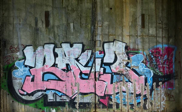 Tekstury Fragmentu Muru Malowaniem Graffiti Który Jest Przedstawiony Nim Obraz — Zdjęcie stockowe
