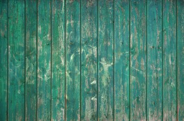 Eski bir rustik ahşap çit düz işlenmiş kurullarında yapılan doku. Bir sokak çit ahşap malzeme close-up yapılan bir rustik türü ayrıntılı görüntü