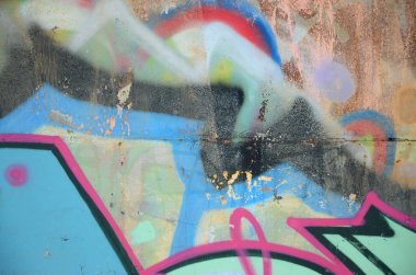 Sprey boya ile duvar uygulanan yakın çekim parçası bir grafiti çizim. Arka plan resmini ve renkli alanları modern bir bileşimi. Sokak sanatı kavramı