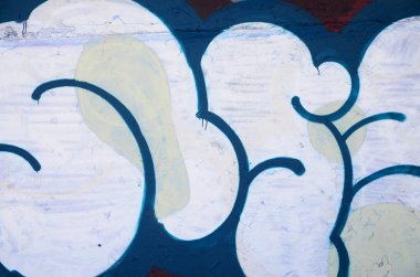 Sprey boya ile duvar uygulanan yakın çekim parçası bir grafiti çizim. Arka plan resmini ve renkli alanları modern bir bileşimi. Sokak sanatı kavramı