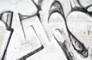 Sprey boya ile duvar uygulanan yakın çekim parçası bir grafiti çizim. Arka plan resmini ve renkli alanları modern bir bileşimi. Sokak sanatı kavramı