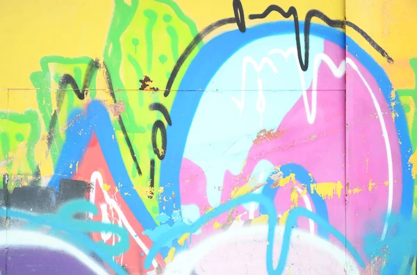 Sprey boya ile duvar uygulanan yakın çekim parçası bir grafiti çizim. Arka plan resmini ve renkli alanları modern bir bileşimi. Sokak sanatı kavramı