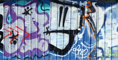 Eski duvar boyalı renkli grafiti çizim mavi sprey boyalar. Duvar yazılarını ve sokak sanat çizim Tema arka plan görüntüsü