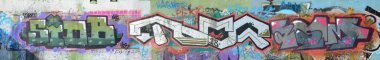 Eski duvar boyalı renkli grafiti sprey boya ile çizim içinde. Duvar yazılarını ve sokak sanat çizim Tema arka plan görüntüsü