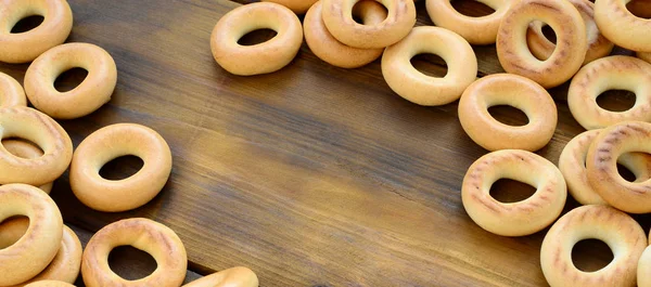 Egy Csomó Friss Sárga Bagels Hazugság Felszínen Régi Sötét Népszerű — Stock Fotó