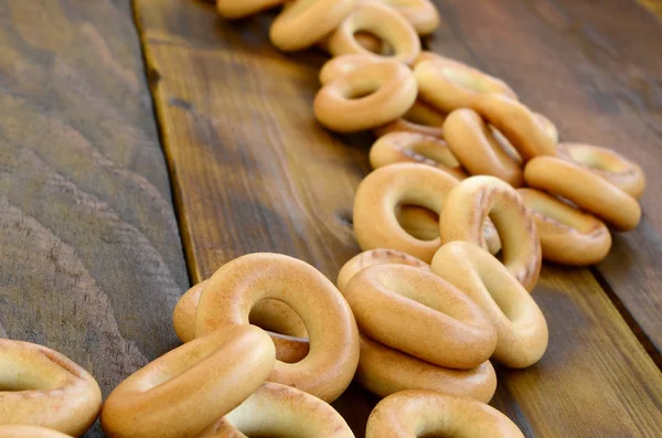 Egy Csomó Friss Sárga Bagels Hazugság Felszínen Régi Sötét Népszerű — Stock Fotó