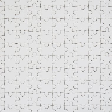 Beyaz jigsaw bulmaca monte durumda doku kapatın. Üstten Görünüm. Büyük bir bütün mozaik birçok bileşenleri birleştirilmiştir