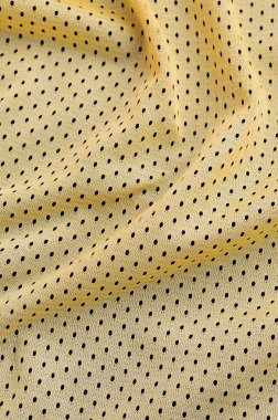 Sarı spor jersey giyim kumaş doku ve arka plan ile 