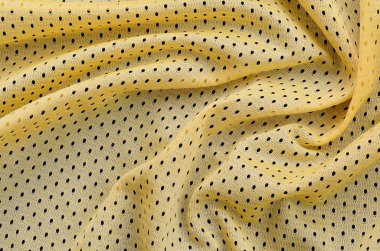 Sarı spor jersey giyim kumaş doku ve arka plan ile birçok çiziklere