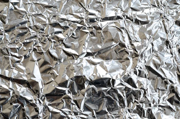 눌린된 알루미늄 텍스처에 반짝이 구겨진된 표면의 주름된 — 스톡 사진