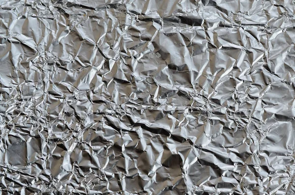 Thin Wrinkled Sheet Crushed Tin Aluminum Silver Foil Background Shiny — Stock Photo, Image