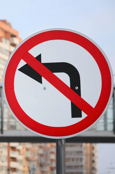 Turn left is prohibited. Traffic sign with crossed out arrow to the left