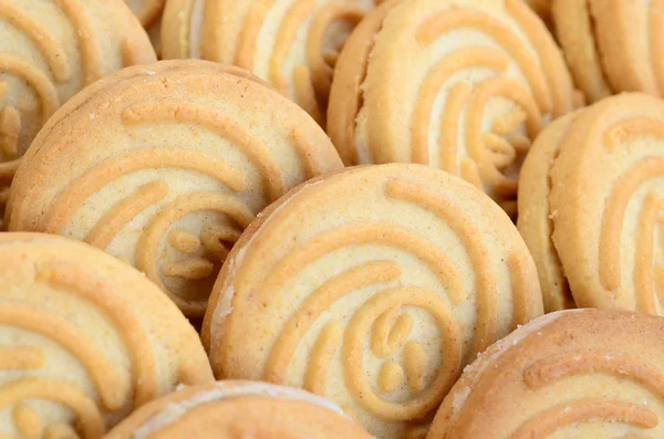 stock image Close-up of a large number of round cookies with coconut filling