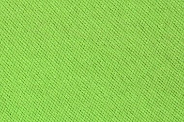 Kumaş dokusuna parlak yeşildir. Gömlek ve bluz yapmak için malzeme