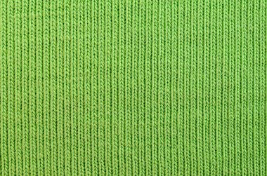 Kumaş dokusuna parlak yeşildir. Gömlek ve bluz yapmak için malzeme