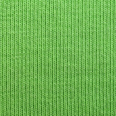 Kumaş dokusuna parlak yeşildir. Gömlek ve bluz yapmak için malzeme