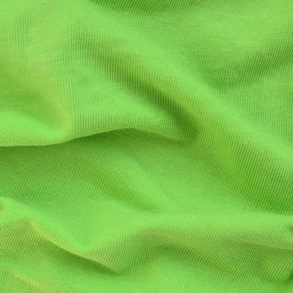 织物的质地是明亮的绿色 衬衫和衬衣的制作材料 — 图库照片