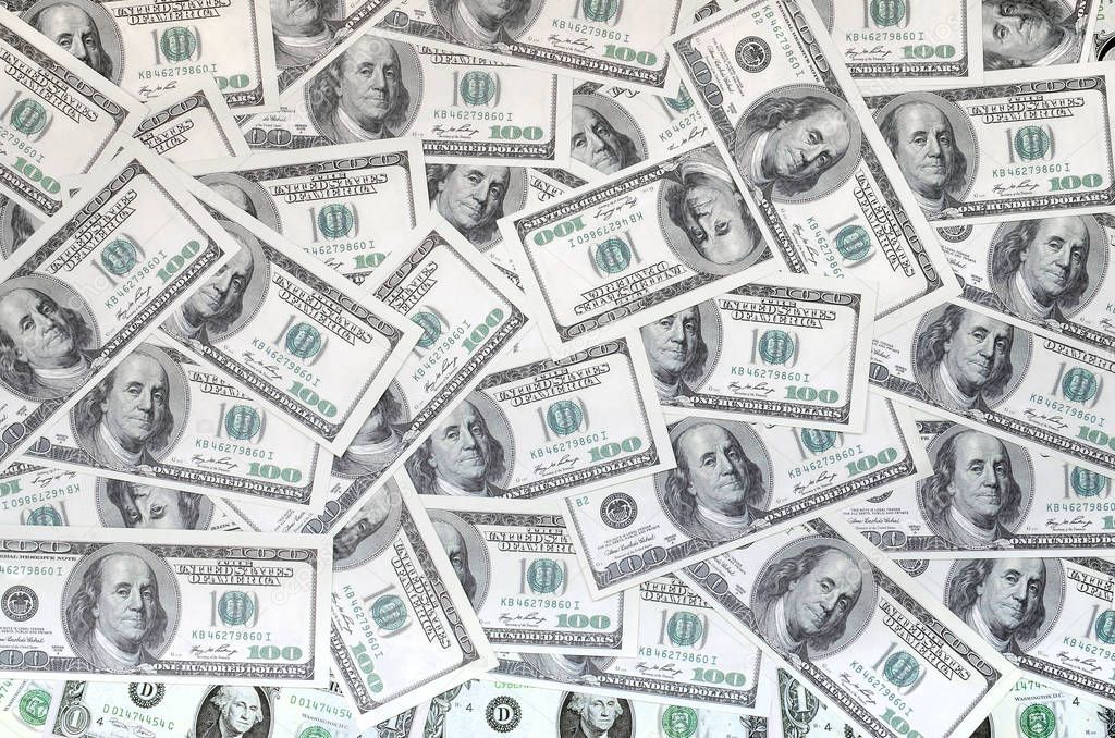 A pattern of many dollar bills. Background image