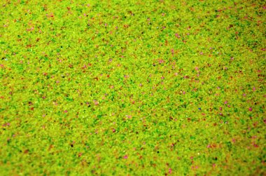 Renkli taneli kum dokusuna yakın çekim. Sarı tahıl