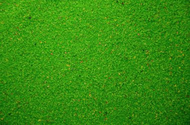 Renkli taneli kum dokusuna yakın çekim. Yeşil tahıl